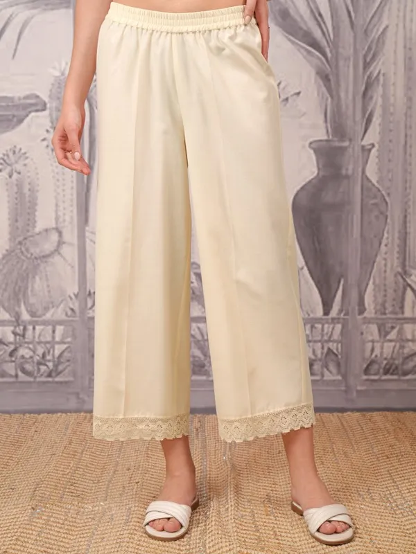  Vishudh Women Cream Solid Straight Fit Palazzos