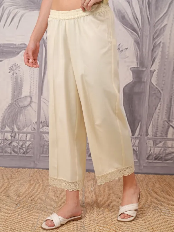  Vishudh Women Cream Solid Straight Fit Palazzos