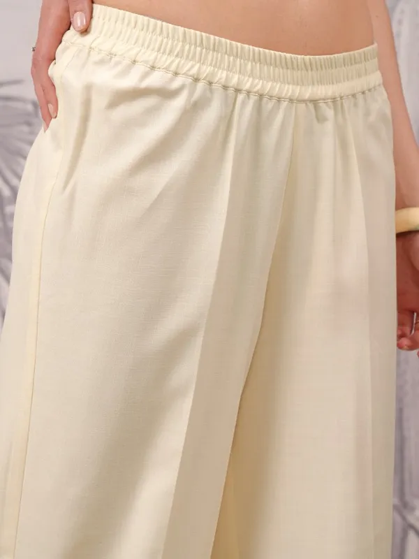  Vishudh Women Cream Solid Straight Fit Palazzos