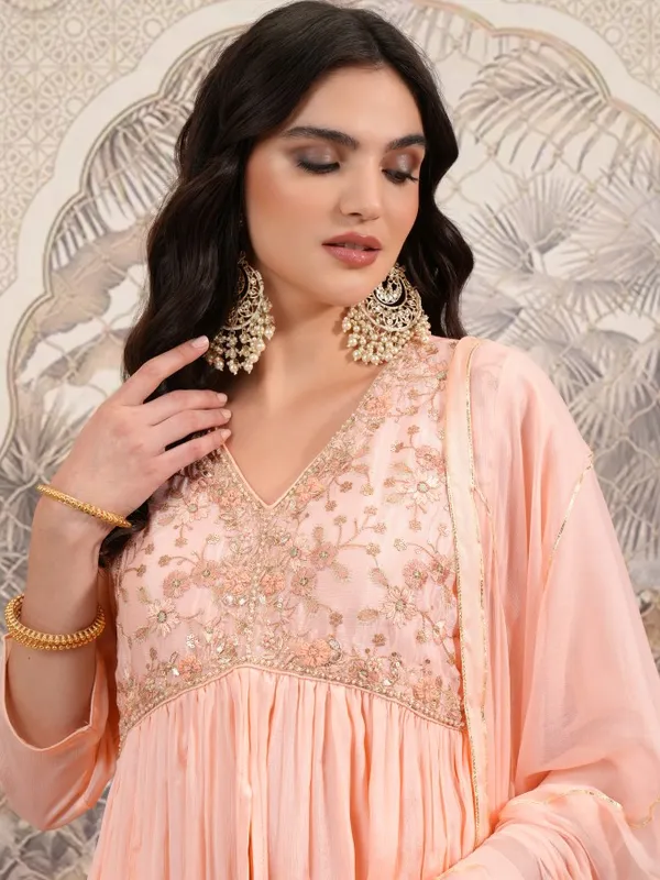  Vishudh Women Peach Embroidered Kurta Sets