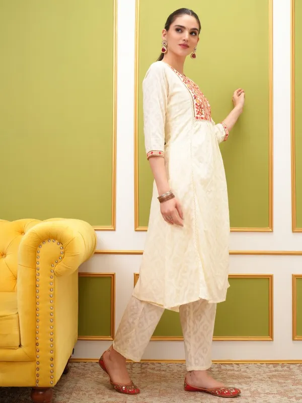  Vishudh Women Cream Embroidered Kurta Sets