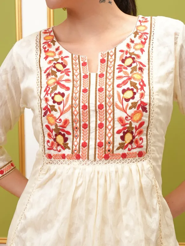  Vishudh Women Cream Embroidered Kurta Sets