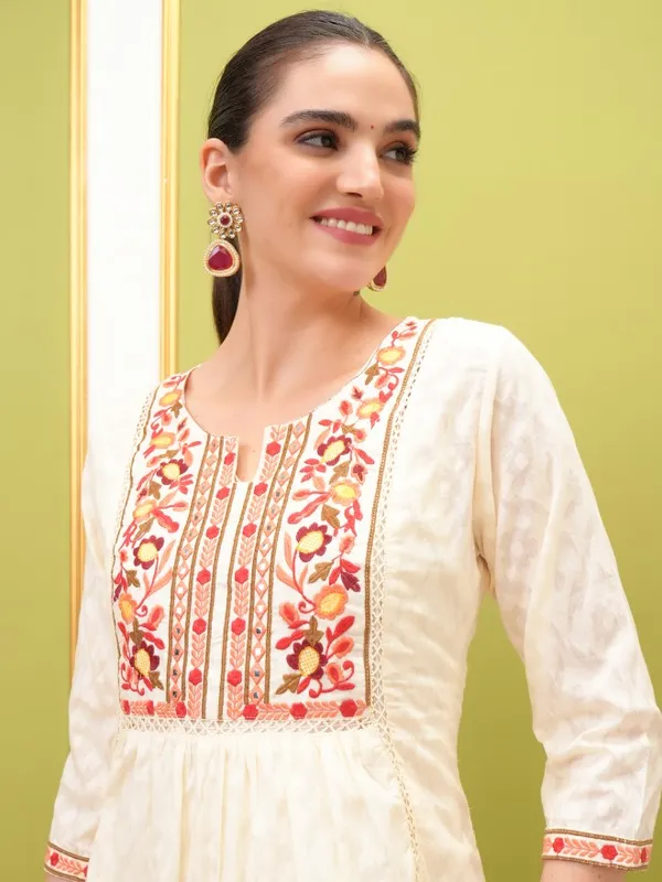  Vishudh Women Cream Embroidered Kurta Sets