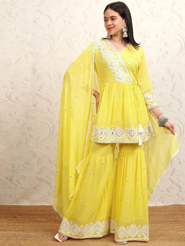 Vishudh Women Yellow Embroidered Kurta With Sharara & Dupatta