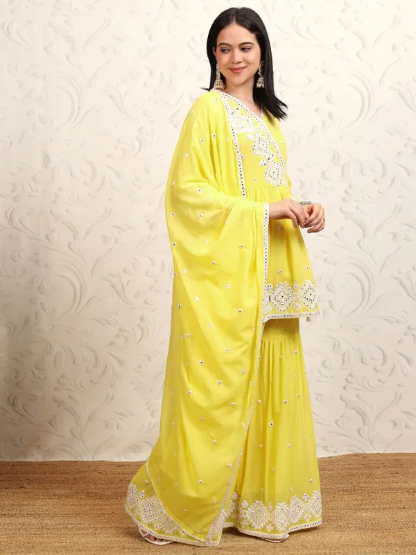 Vishudh Women Yellow Embroidered Kurta With Sharara & Dupatta
