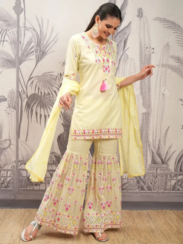 Vishudh Women Yellow Embroidered Kurta With Sharara And Dupatta