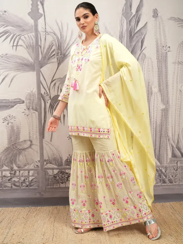 Vishudh Women Yellow Embroidered Kurta With Sharara And Dupatta