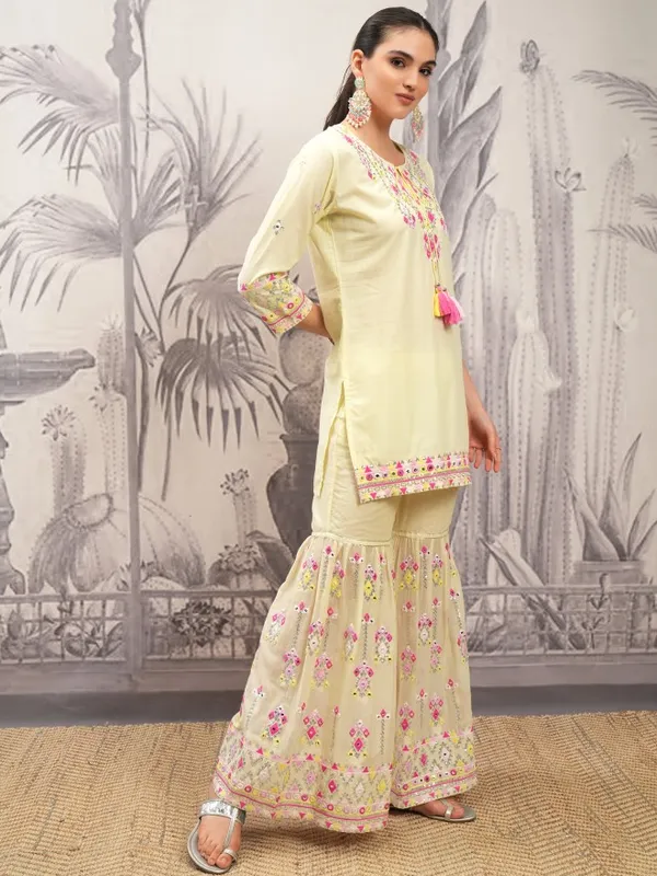 Vishudh Women Yellow Embroidered Kurta With Sharara And Dupatta