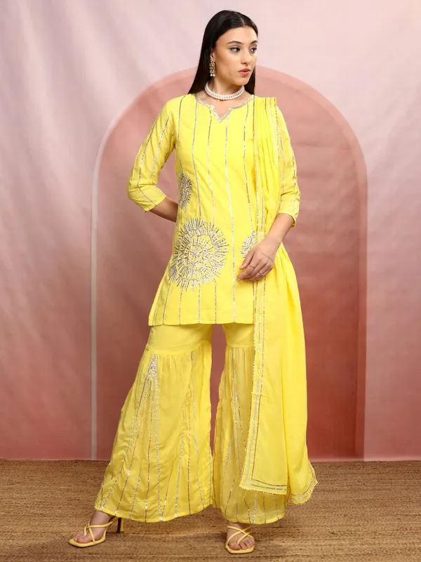 Vishudh Women Yellow Embroidered Kurta With Sharara And Dupatta
