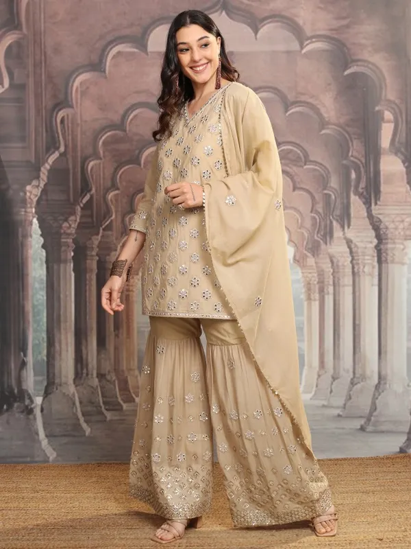 Vishudh Women Beige Embroidered Kurta With Sharara And Dupatta
