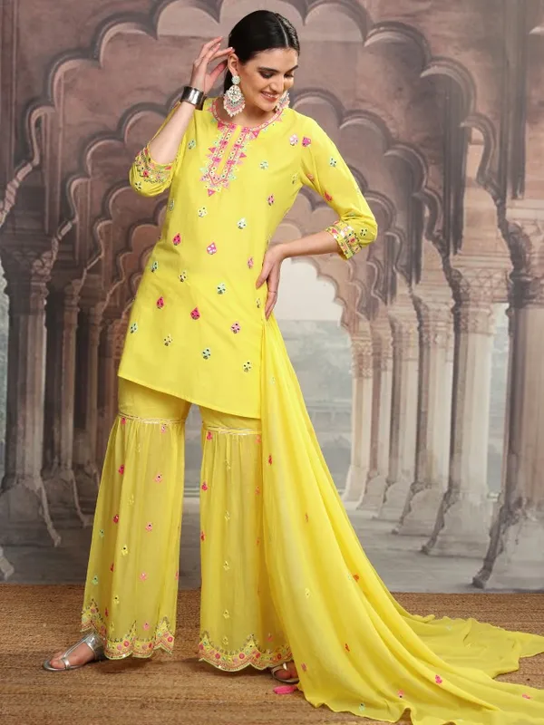 Vishudh Women Yellow Embroidered Kurta With Sharara And Dupatta