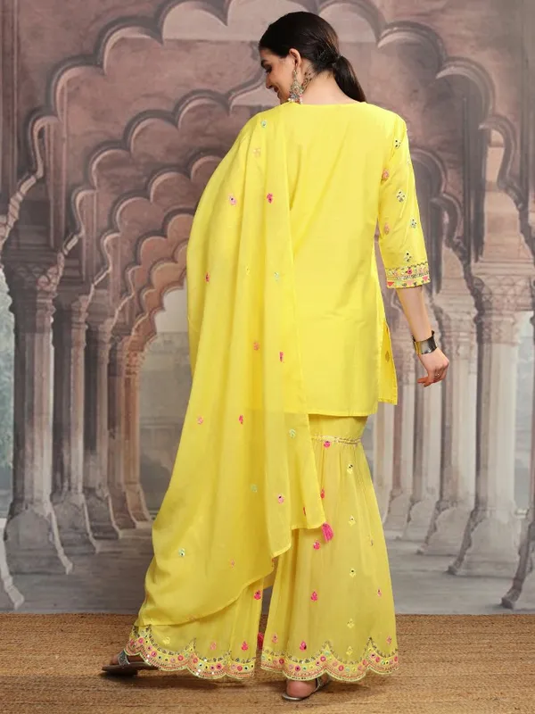 Vishudh Women Yellow Embroidered Kurta With Sharara And Dupatta