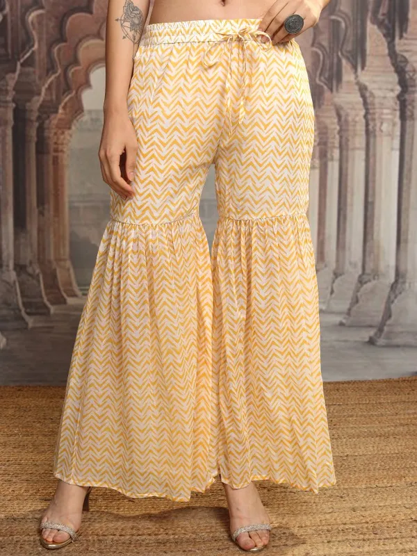 Vishudh Women Yellow Printed Kurta With Sharara And Dupatta