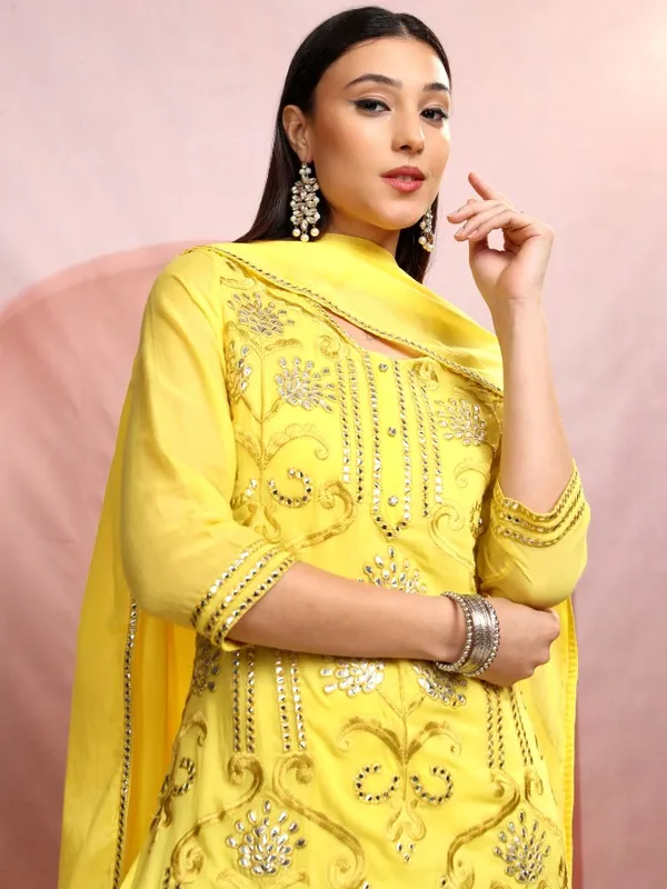 Vishudh Women Yellow Embroidered Kurta With Sharara And Dupatta