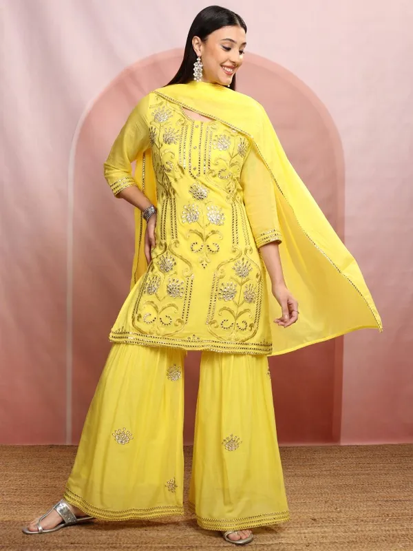 Vishudh Women Yellow Embroidered Kurta With Sharara And Dupatta