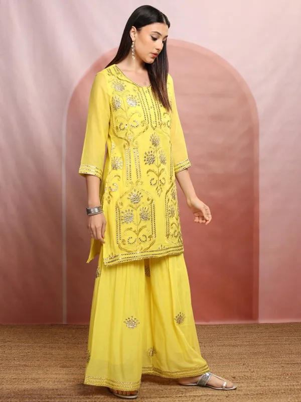 Vishudh Women Yellow Embroidered Kurta With Sharara And Dupatta