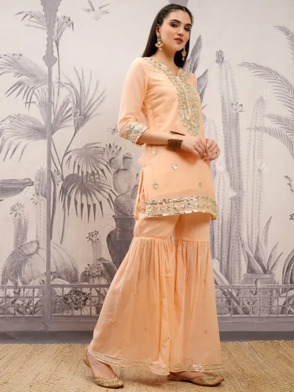 Vishudh Women Orange Embroidered Kurta With Sharara And Dupatta