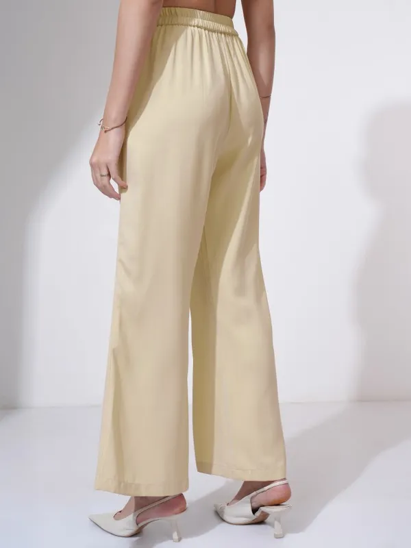 Tokyo Talkies Women Beige Solid Flared Casual Trouser