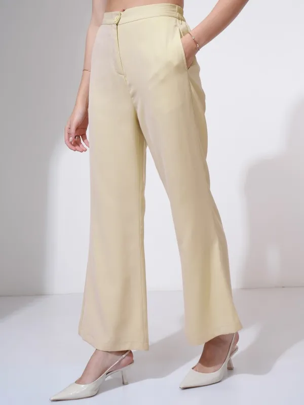 Tokyo Talkies Women Beige Solid Flared Casual Trouser