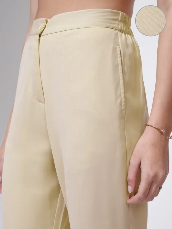 Tokyo Talkies Women Beige Solid Flared Casual Trouser