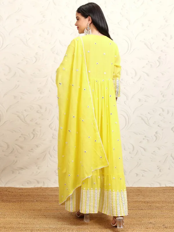 Vishudh Women Yellow Embroidered Kurta With Trousers & Dupatta