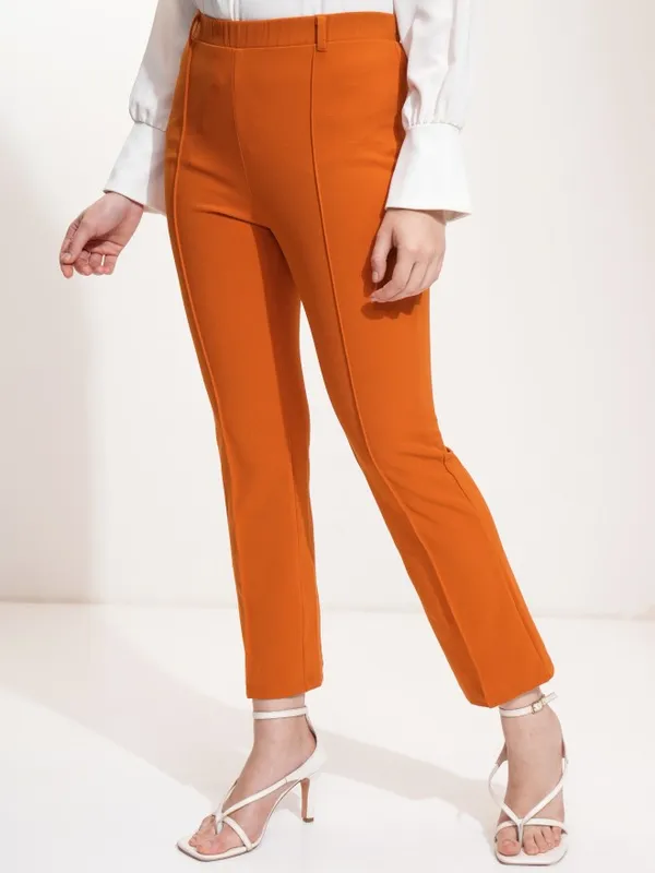 Tokyo Talkies Women Rust Flared Solid Trousers