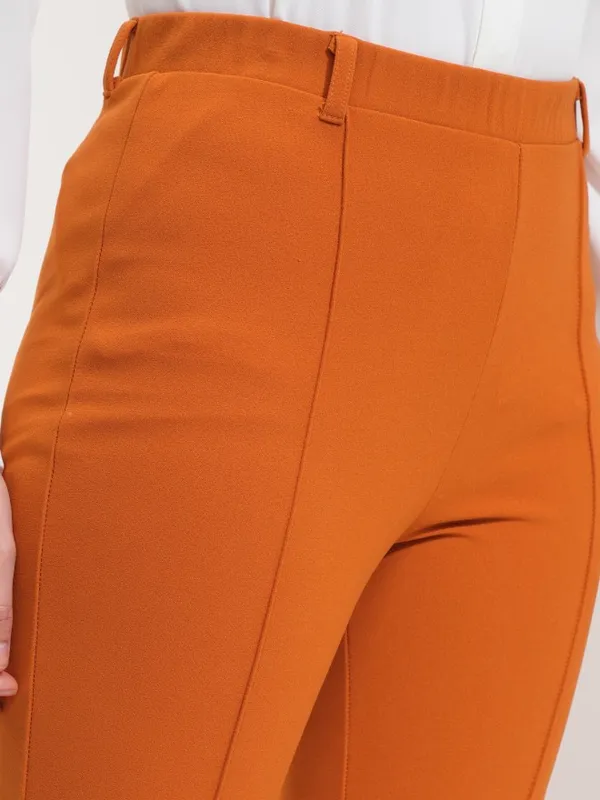 Tokyo Talkies Women Rust Flared Solid Trousers