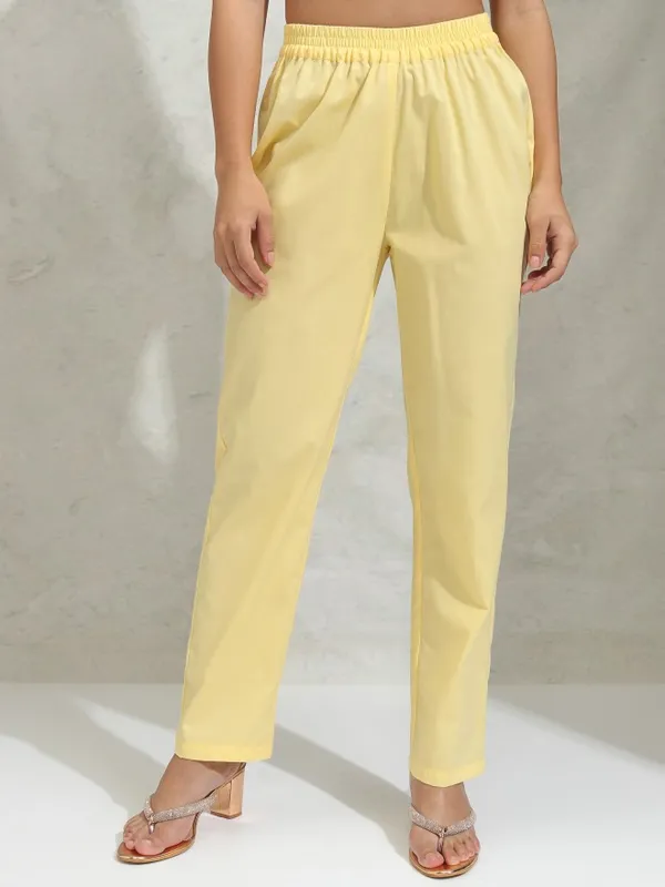 Vishudh Women Yellow Solid Regular Round Neck Kurta With Neck Patch Three Quarter Sleeves And Slim Pants 