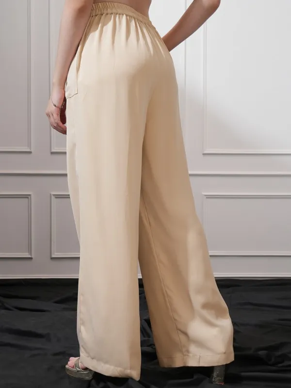 Tokyo Talkies Women Beige Solid Flared Casual Trouser