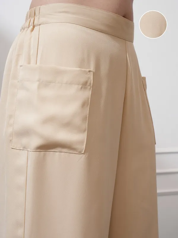 Tokyo Talkies Women Beige Solid Flared Casual Trouser