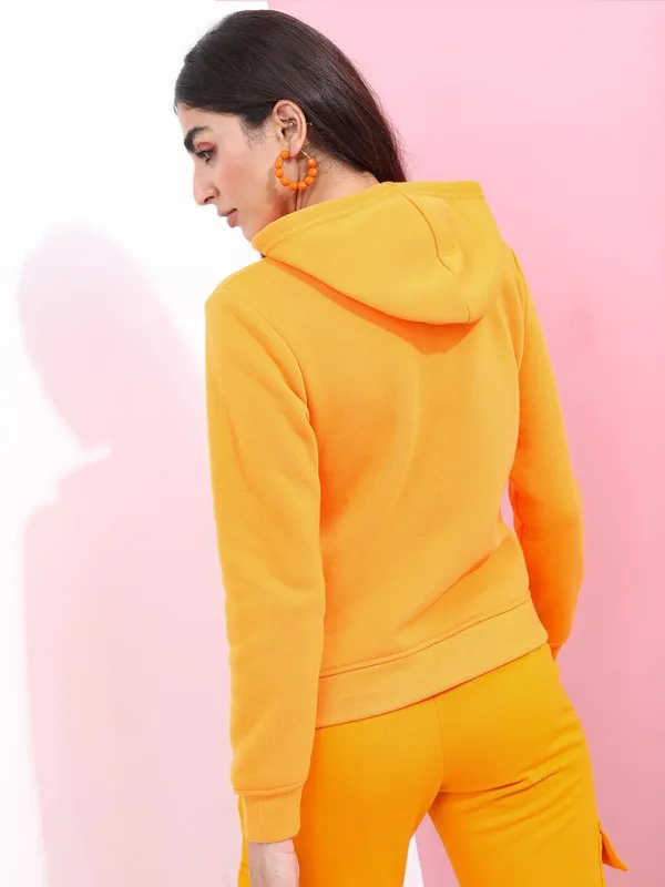 Tokyo Talkies Women Orange Solid Pullover Hood Sweatshirt