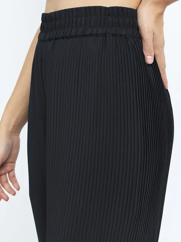 Tokyo Talkies Women Black Solid Flared Casual Trouser