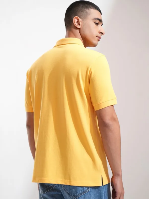 Highlander Men Yellow Solid Polo Collar T-Shirt