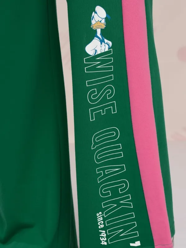 Disney By Tokyo Talkies Women Green Donald Duck Printed Flared Casual Trouser