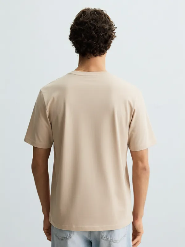 Highlander Men Beige Solid Round Neck T-Shirt