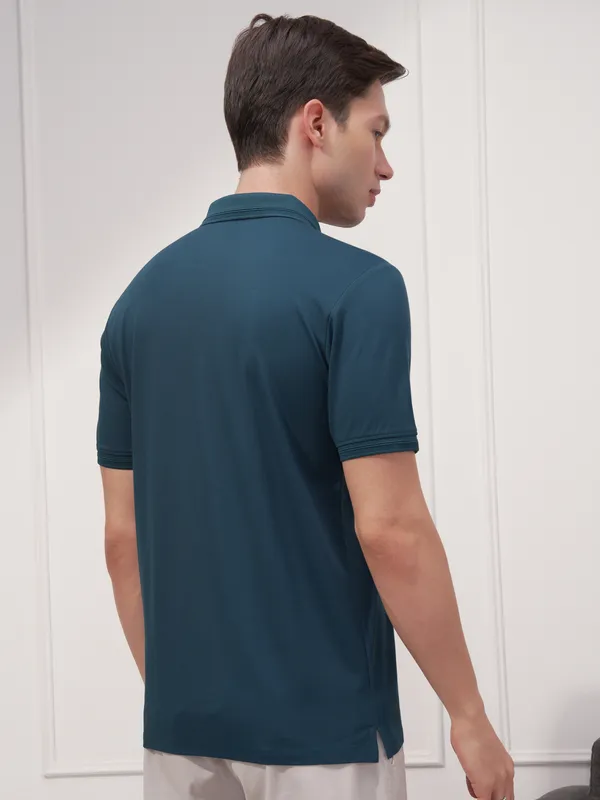 Highlander Men Teal Solid Polo Collar T-Shirt