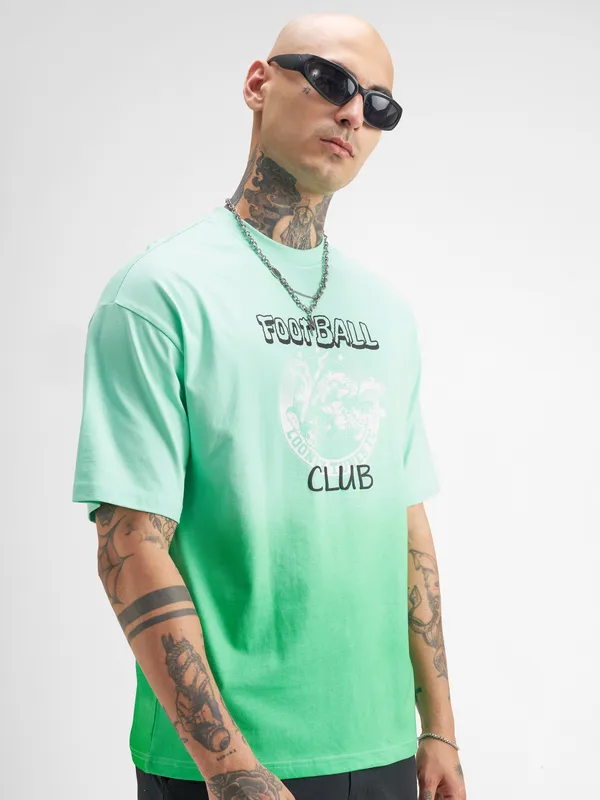 WB By Highlander Men Green Looney Tunes Printed Round Neck Oversized Fit T-Shirt