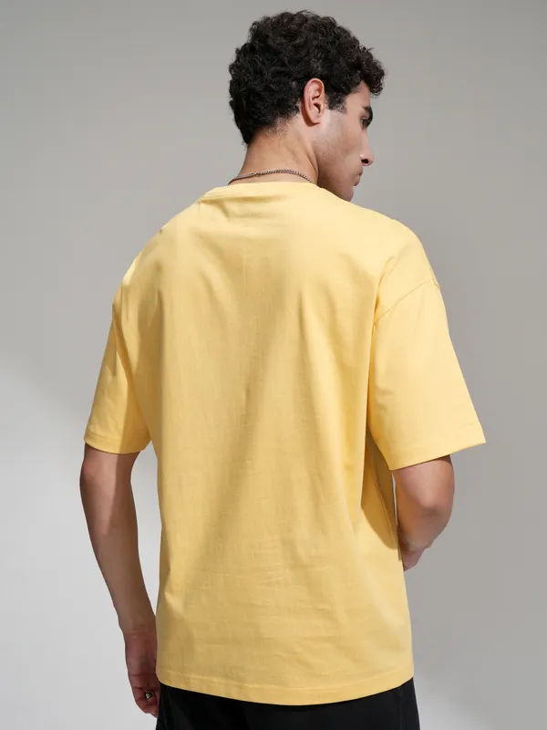 WB By Highlander Men Yellow Looney Tunes Printed Oversized Fit T-Shirt