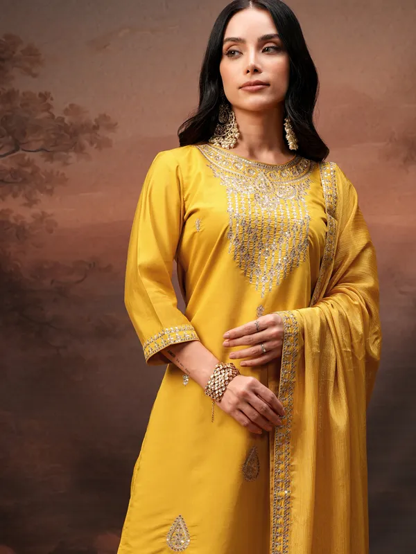 Vishudh Women Yellow Embroidered Kurta With Trouser And Dupatta