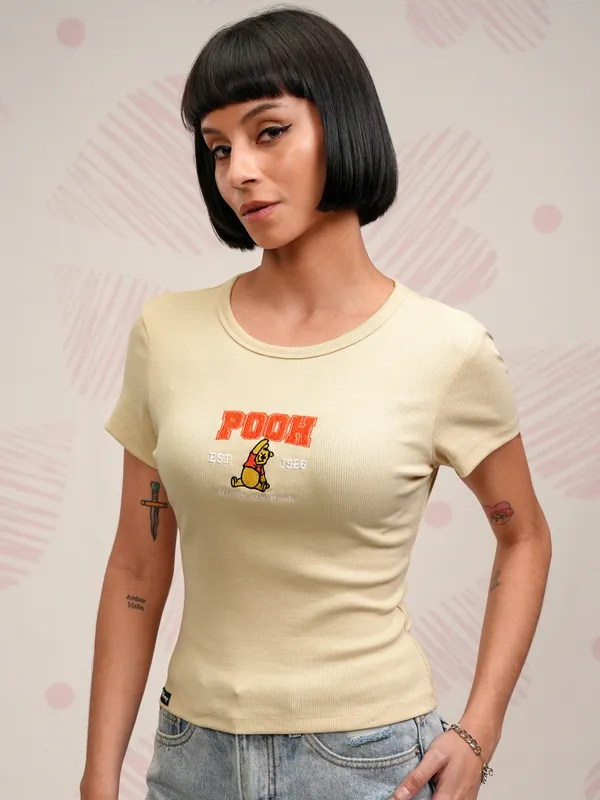 Disney By Tokyo Talkies Women Beige Winnie The Pooh Self Design Slim Fit T-Shirt