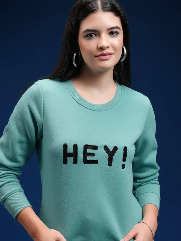 Women Solid Sweatshirt