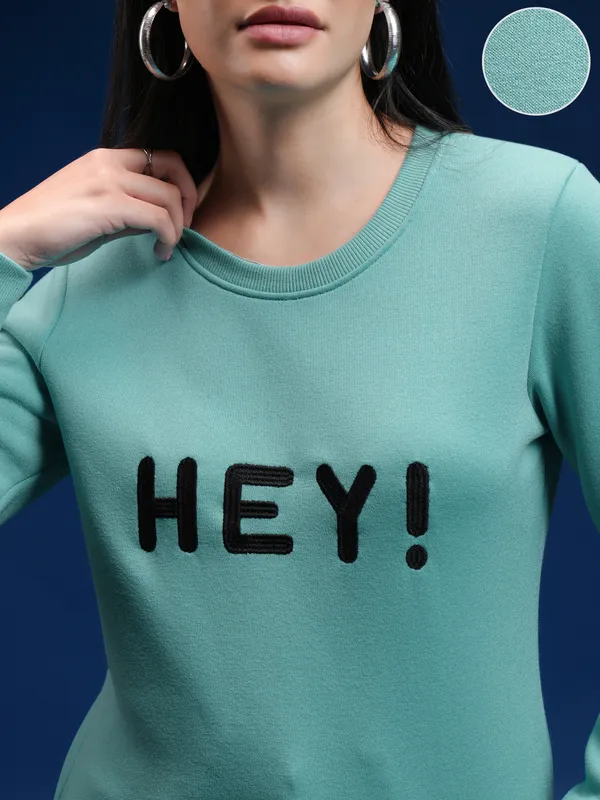 Women Solid Sweatshirt
