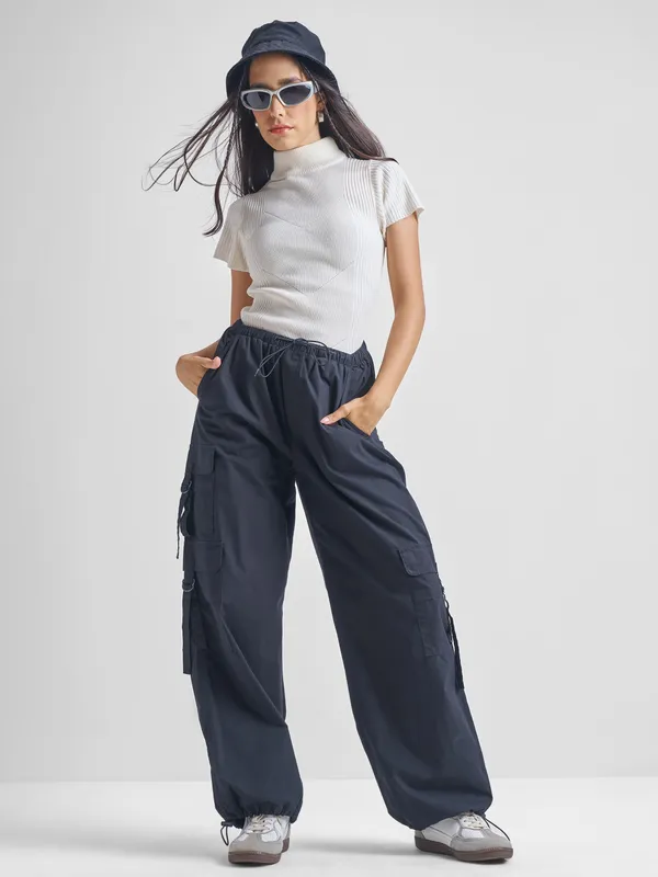 Women Solid Sweaters