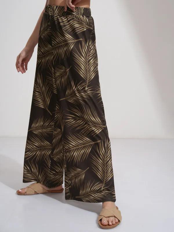 Tokyo Talkies Women Brown Printed Flared Casual Trousers