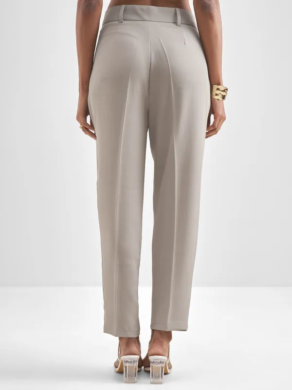 Chic By Tokyo Talkies Women Beige Solid Tapered Fit Trouser