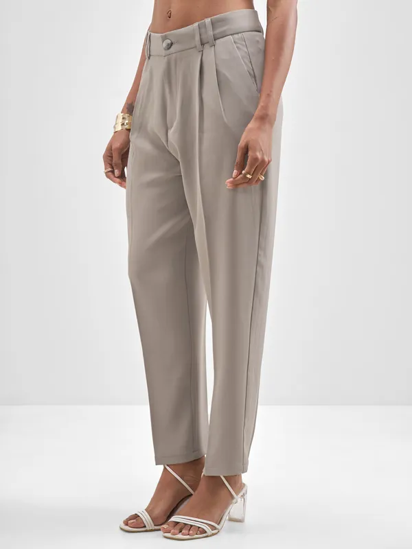 Chic By Tokyo Talkies Women Beige Solid Tapered Fit Trouser