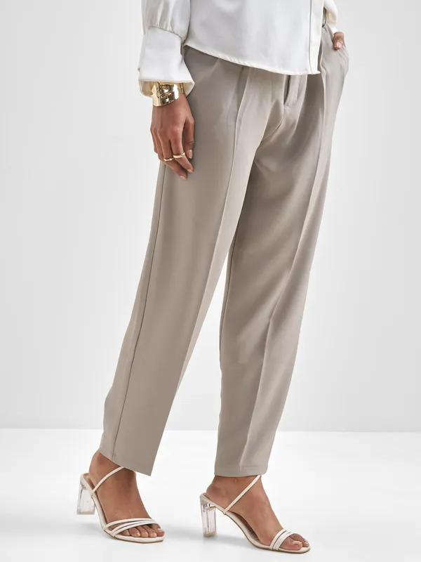 Chic By Tokyo Talkies Women Beige Solid Tapered Fit Trouser