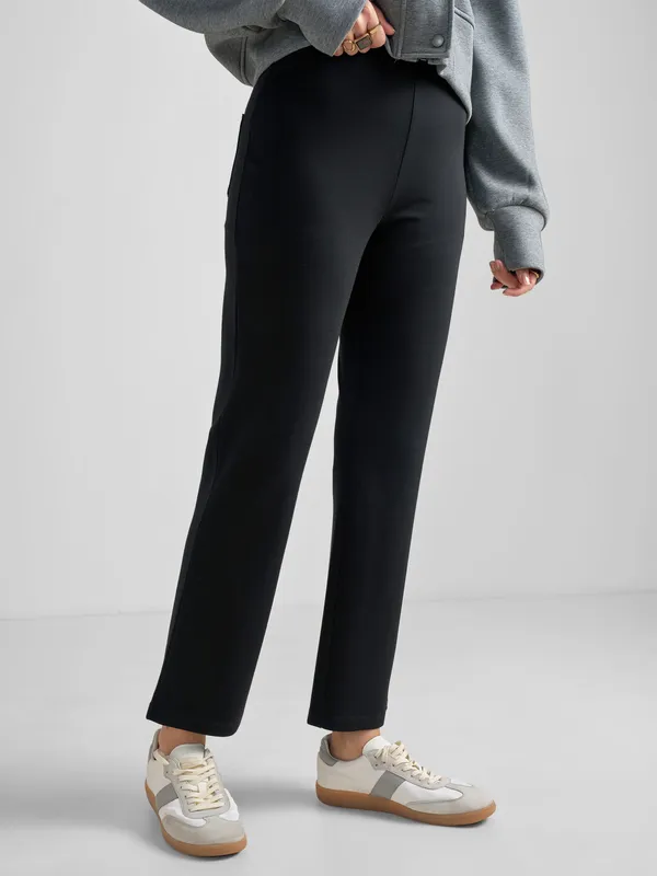 Tokyo Talkies Women Black Solid Bootcut Regular Trouser