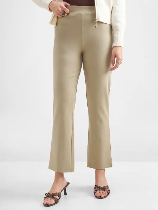 Tokyo Talkies Women Tan Solid Bootcut Regular Trouser