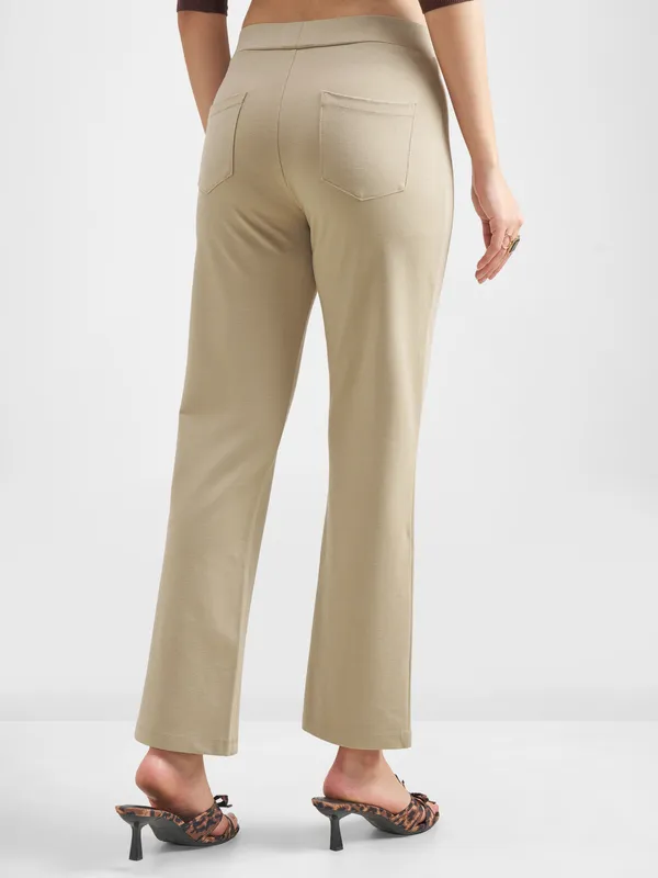 Tokyo Talkies Women Tan Solid Bootcut Regular Trouser